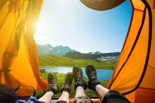 feet_hanging_out_of_tent