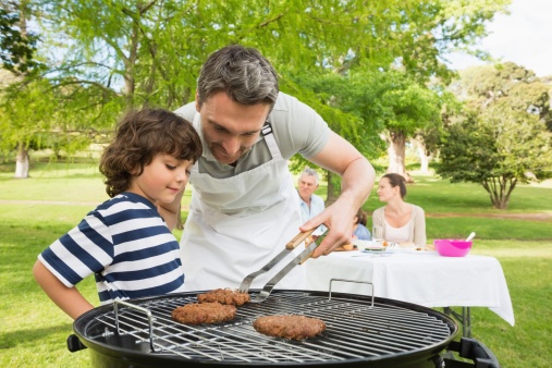 dad_and_son_barbecuing_burgers