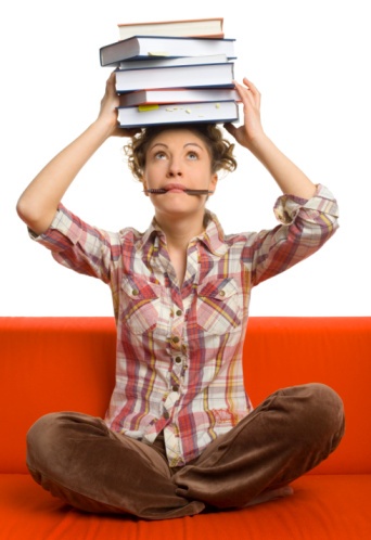 college_student_balancing_textbooks_on_her_head