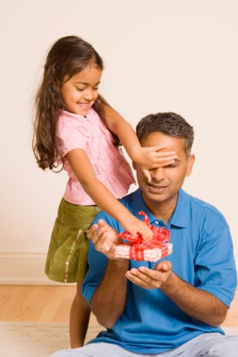 daughter_giving_dad_a_gift